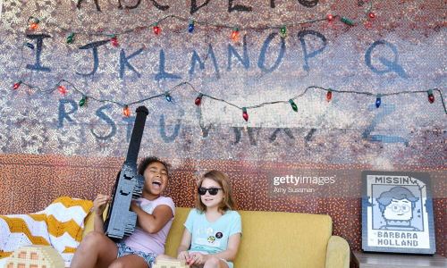 SANTA MONICA, CALIFORNIA - JUNE 29: Fans pose at the many photo-op stations at the Netflix's "Stranger Things" Season 3 Fun Fair at Santa Monica Pier on June 29, 2019 in Santa Monica, California. (Photo by Amy Sussman/Getty Images)