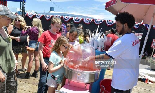 SANTA MONICA, CALIFORNIA - JUNE 29: Fans wait for cotton candy at Netflix's "Stranger Things" Season 3 Fun Fair at Santa Monica Pier on June 29, 2019 in Santa Monica, California. (Photo by Amy Sussman/Getty Images)
