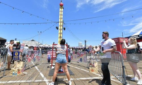 SANTA MONICA, CALIFORNIA - JUNE 29: Fans participate in the many games at Netflix's "Stranger Things" Season 3 Fun Fair at Santa Monica Pier on June 29, 2019 in Santa Monica, California. (Photo by Amy Sussman/Getty Images)