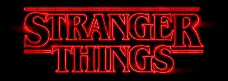 Neon sign displaying the Stranger Things logo in red for themed events.