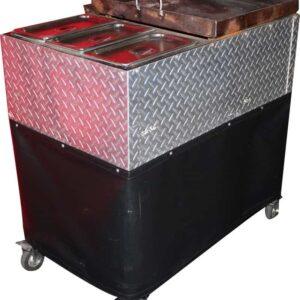 Mobile taco cart with storage and serving area for events.